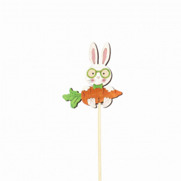 Wooden bunny with a carrot on an Easter pick